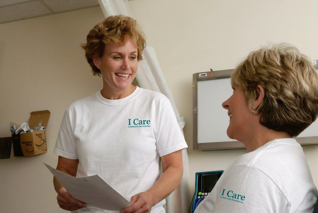 Diverse team of ICCS care professionals in teal uniforms